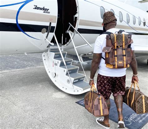 rick ross wearing fake louis vuitton